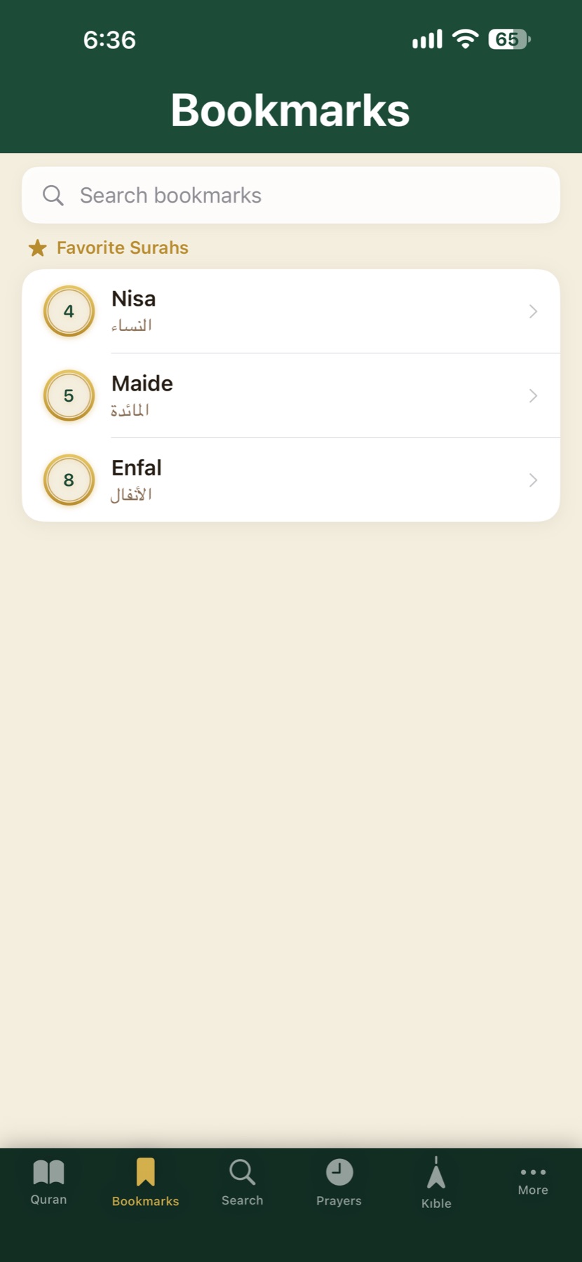 Qur-an Guidance app bookmarks screen listing favorite surahs
